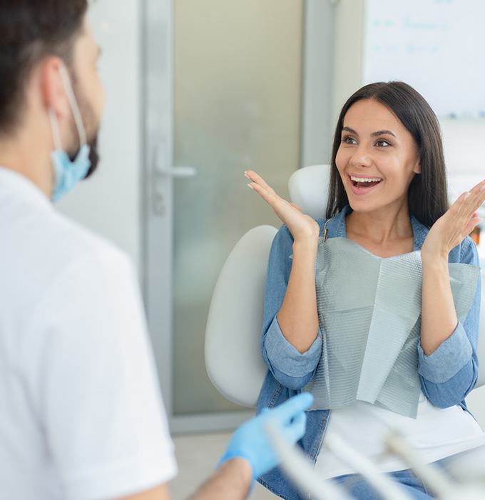  A woman filling out a dental insurance form 