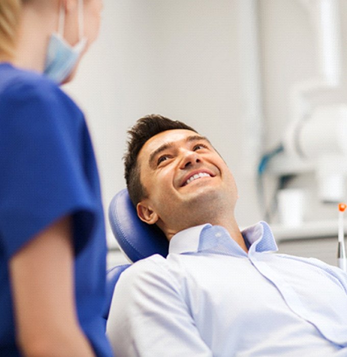 Man smiling after dental implant salvage in Barton City