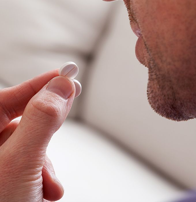 Man taking oral conscious dental sedation pill