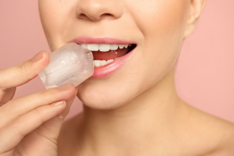 woman closeup of eating ice